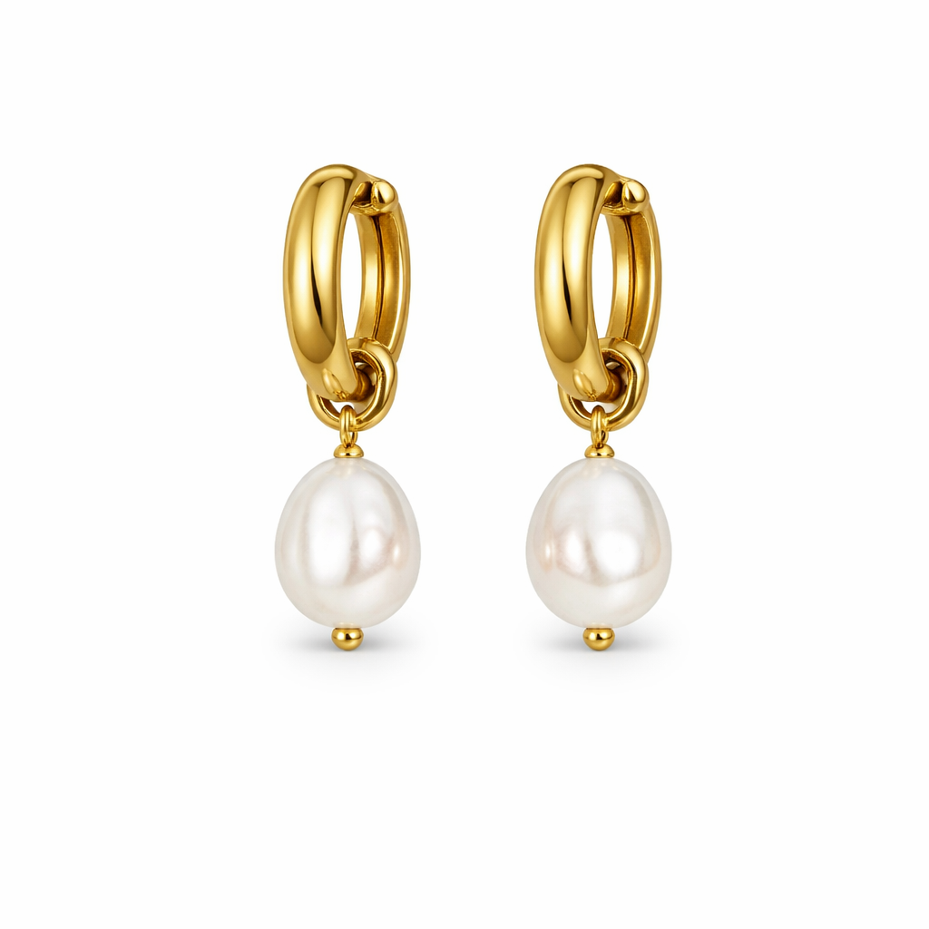 Gold hoop earrings with pearl drops on a white background

