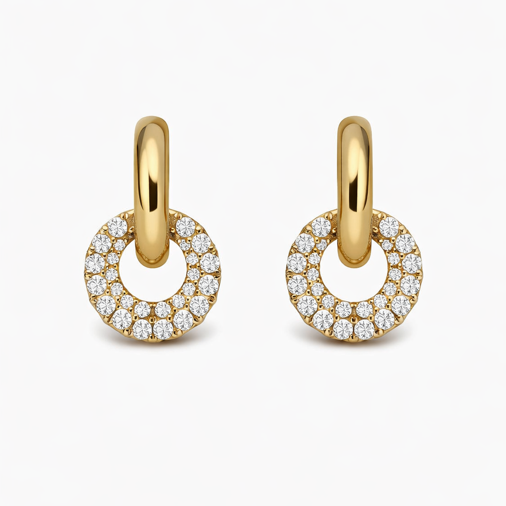 Gold hoop earrings with diamond accents on a white background

