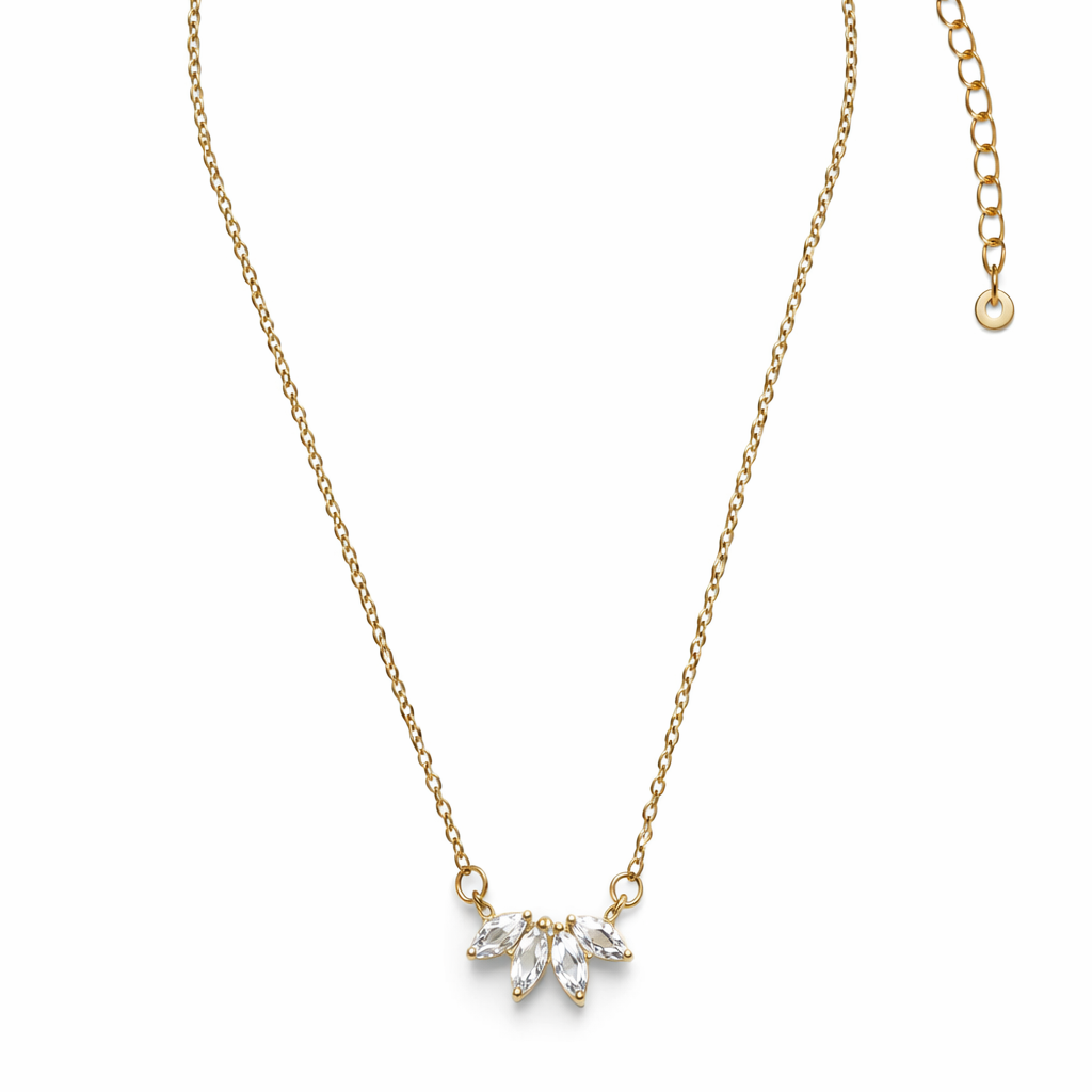 Gold necklace with a floral pendant on a white background

