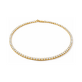 Gold necklace with diamonds on a white background

