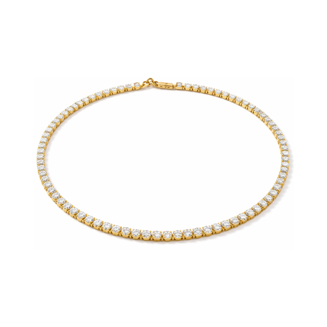 Gold necklace with diamonds on a white background

