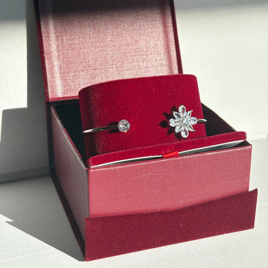 Red jewelry box with a diamond bracelet on a white background


