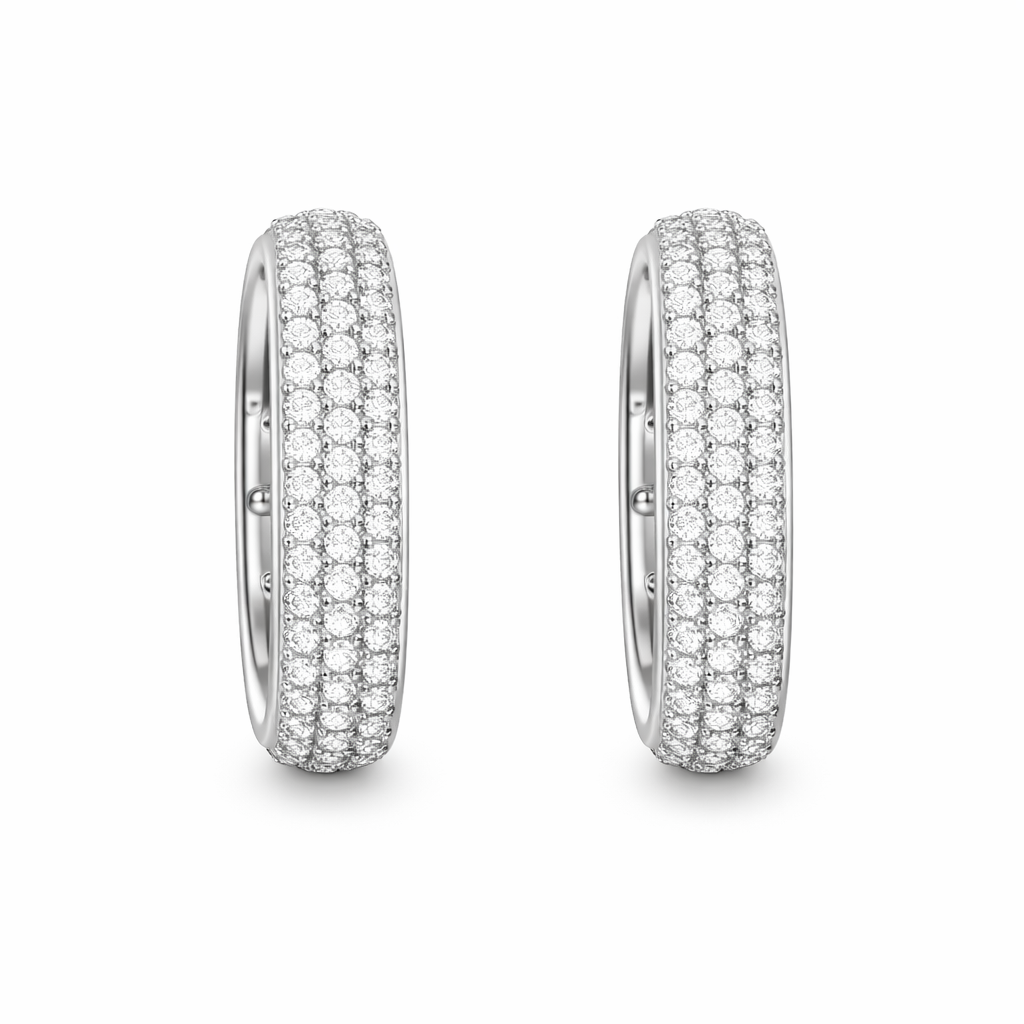 Pair of diamond earrings on a white background

